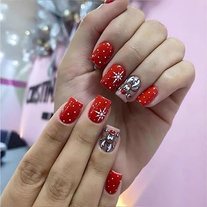 30 Top Red Christmas Nails for a Festive & Festive Manicure 8 30 Top Red Christmas Nails for a Festive & Festive Manicure. Red is the most recognizable color during the Christmas season. Cute Elk Snowflake Design Glossy Full Cover Red Fake Nails 30 Top Red Christmas Nails for a Festive & Festive Manicure