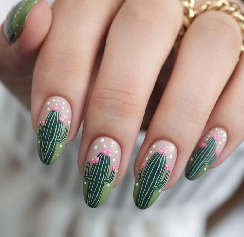 short black, green, and white cactus-designed nails
