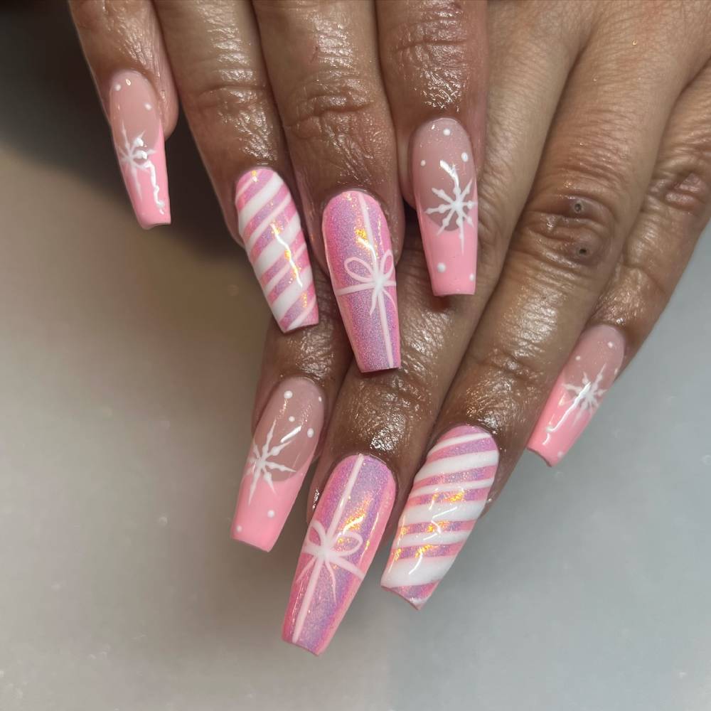 Stunning Pink Long Coffin Nails with Bow and Snowflakes Design