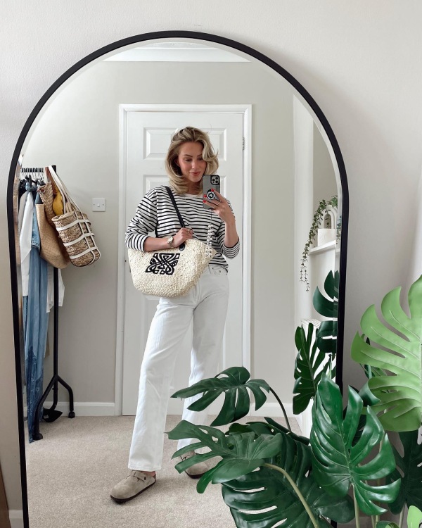 stripped top and white pants outfit for rainy day