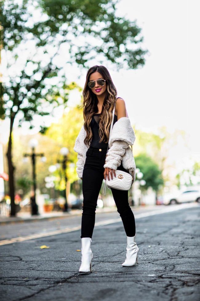 Ankle Boots with Black Jeans and Black top and Teddy Sweater