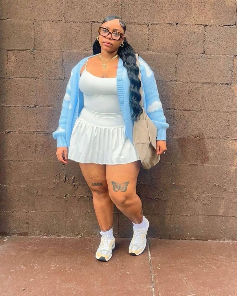 Plus Size Fall Outfit Guide Blue Cardigan with White Tennis Skirt, Crochet Bag, and Sneakers