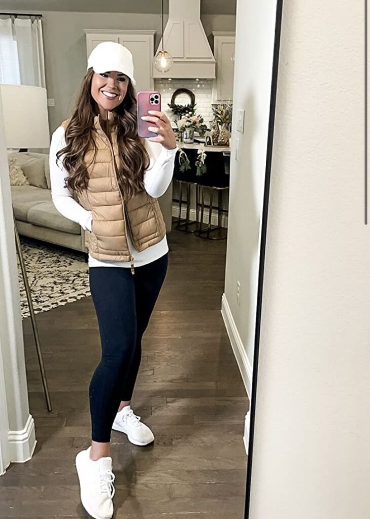 Early fall, look vest with long-sleeved white top 