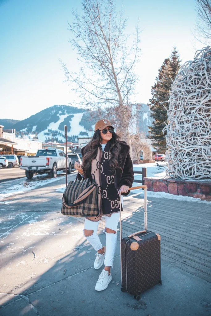 Winter Travel Outfit Ideas Stay Stylish and Warm Wherever You Go 38 Winter travel outfit ideas for women get cozy airport looks, layering tips, and 30 outfit inspirations to stay warm and stylish while traveling this winter. White Ripped Jeans, Blazer and Hat Travel style