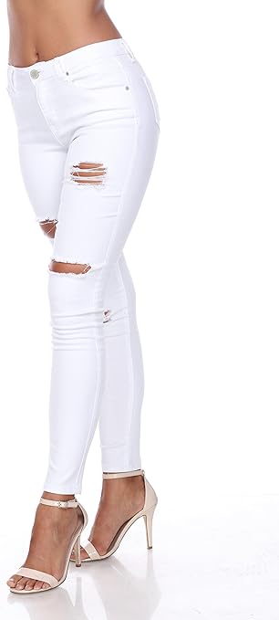 Winter Travel Outfit Ideas Stay Stylish and Warm Wherever You Go 40 Winter travel outfit ideas for women get cozy airport looks, layering tips, and 30 outfit inspirations to stay warm and stylish while traveling this winter. Distressed White Denim Pants