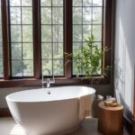 Modern Bathroom Ideas A freestanding oval tub next to a large window A Guide to Sleek, Serene Style Modern Bathroom Ideas