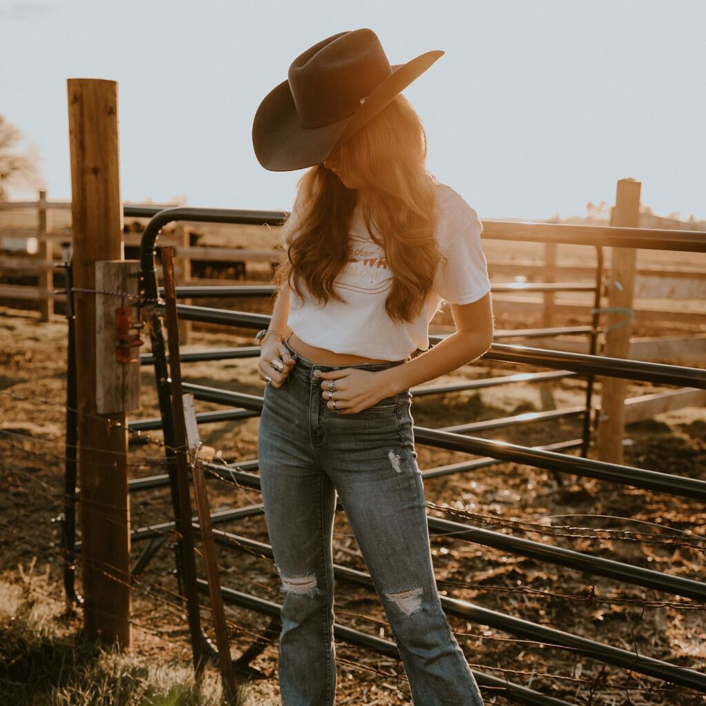Gypsy Cowgirl, Flowy embroidered peasant blouse, wide-leg denim, concho belt, layered necklaces