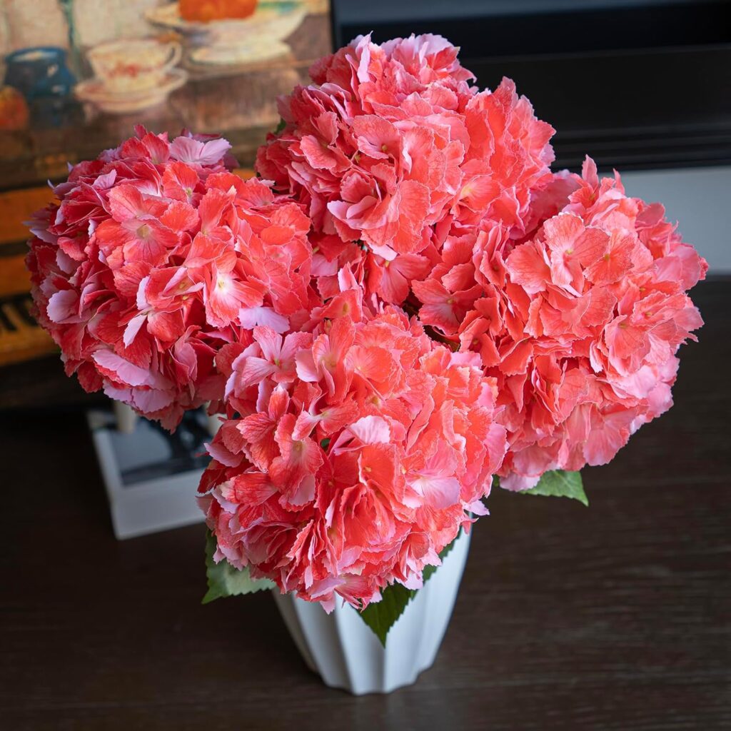 Trendy Artificial Flowers for Summer, Mixed Coral & Peach Roses, Warm, inviting, and perfect for a living room.