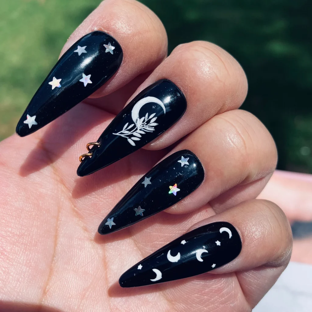 witchy nails design Black matte with delicate white crescent moons and stars