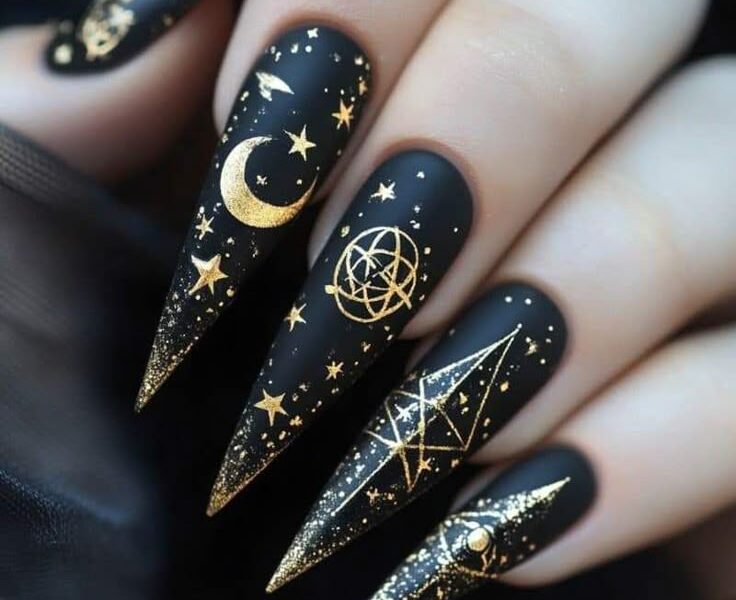 Black with gold celestial symbols serpents moons all seeing eyes Fun Witchy Nail Designs for Halloween