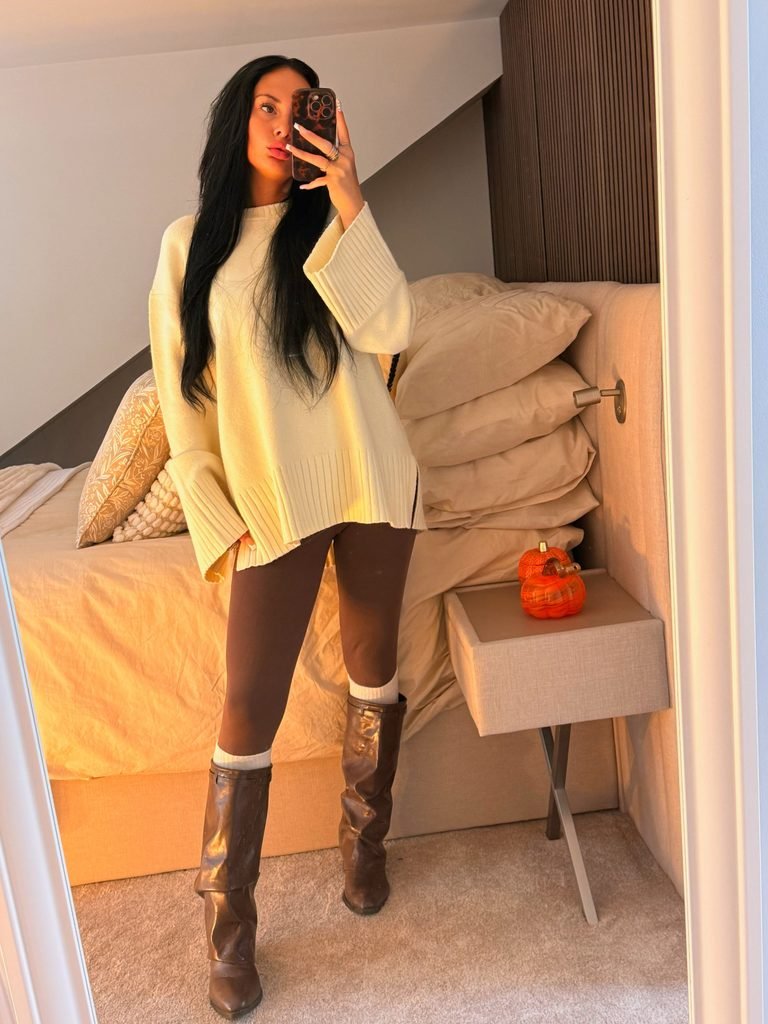 Fall Outfits Over 40: 20 Warm & Cozy Looks for the Season 8 Fall Outfits Over 40: 20 Warm & Cozy Looks for the Season Oversized Sweater + Leggings + Tall Boots